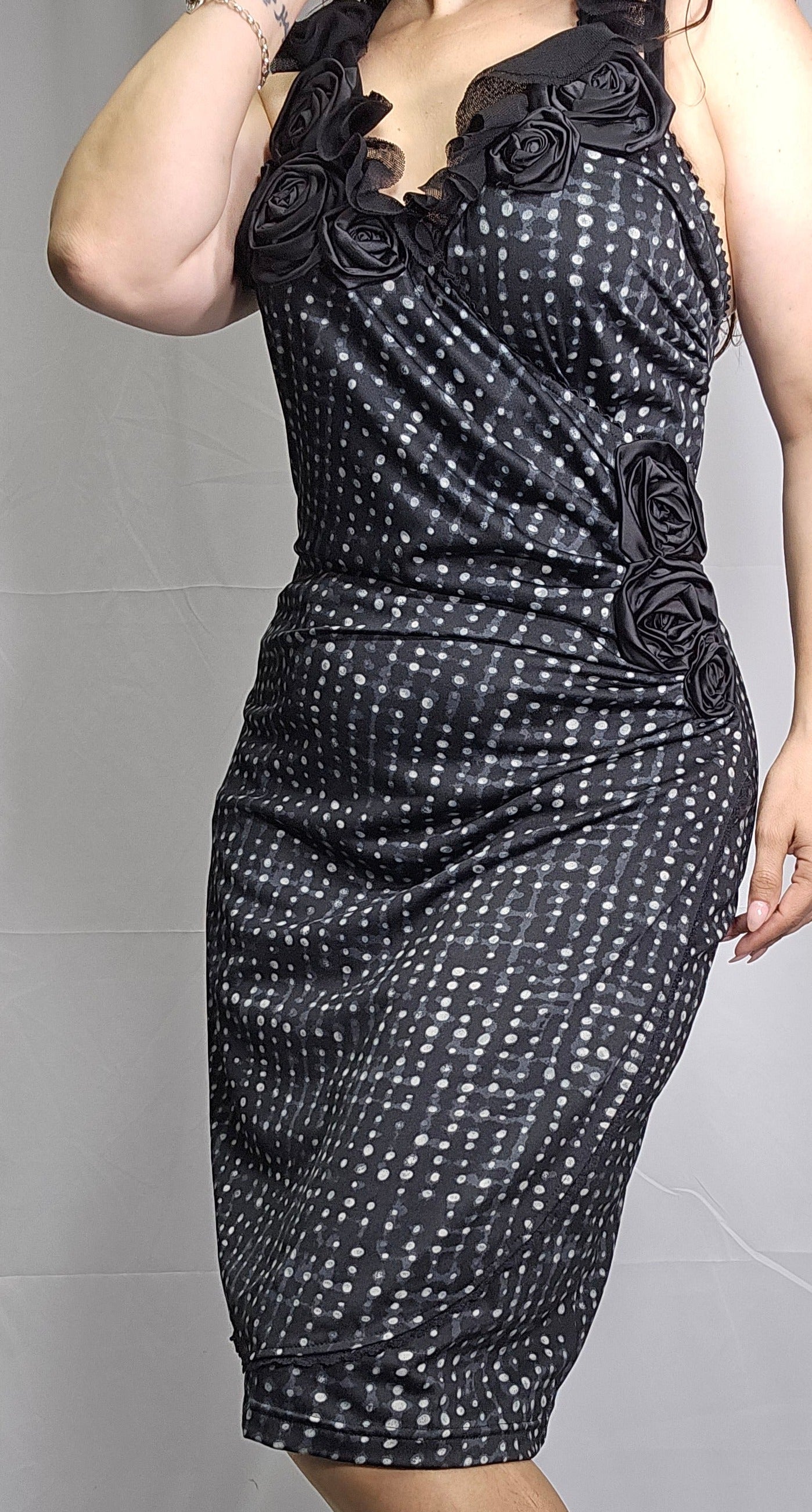 dress made in new zealand in black color with roses details