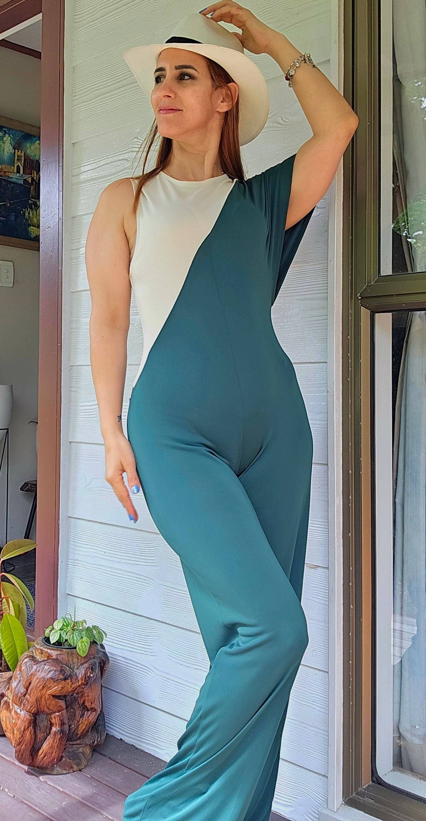 Zara color block hunter green and cream wide-leg jumpsuit with a cap sleeve and keyhole back closure. ZARA Jumpsuit Color Block Hunter Green Wide Leg- Preloved Jumpsuit - NWT jumpsuit in Auckland