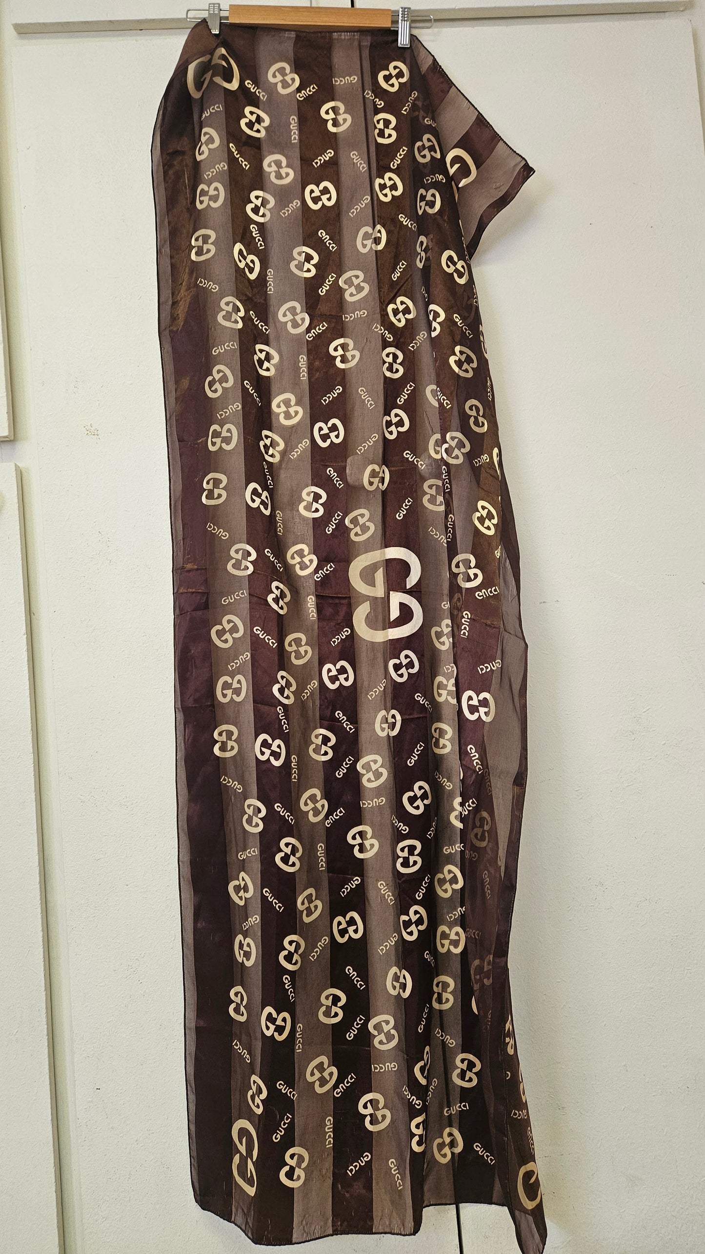 Brown scarf with gucci logo pattern for sale in Auckland