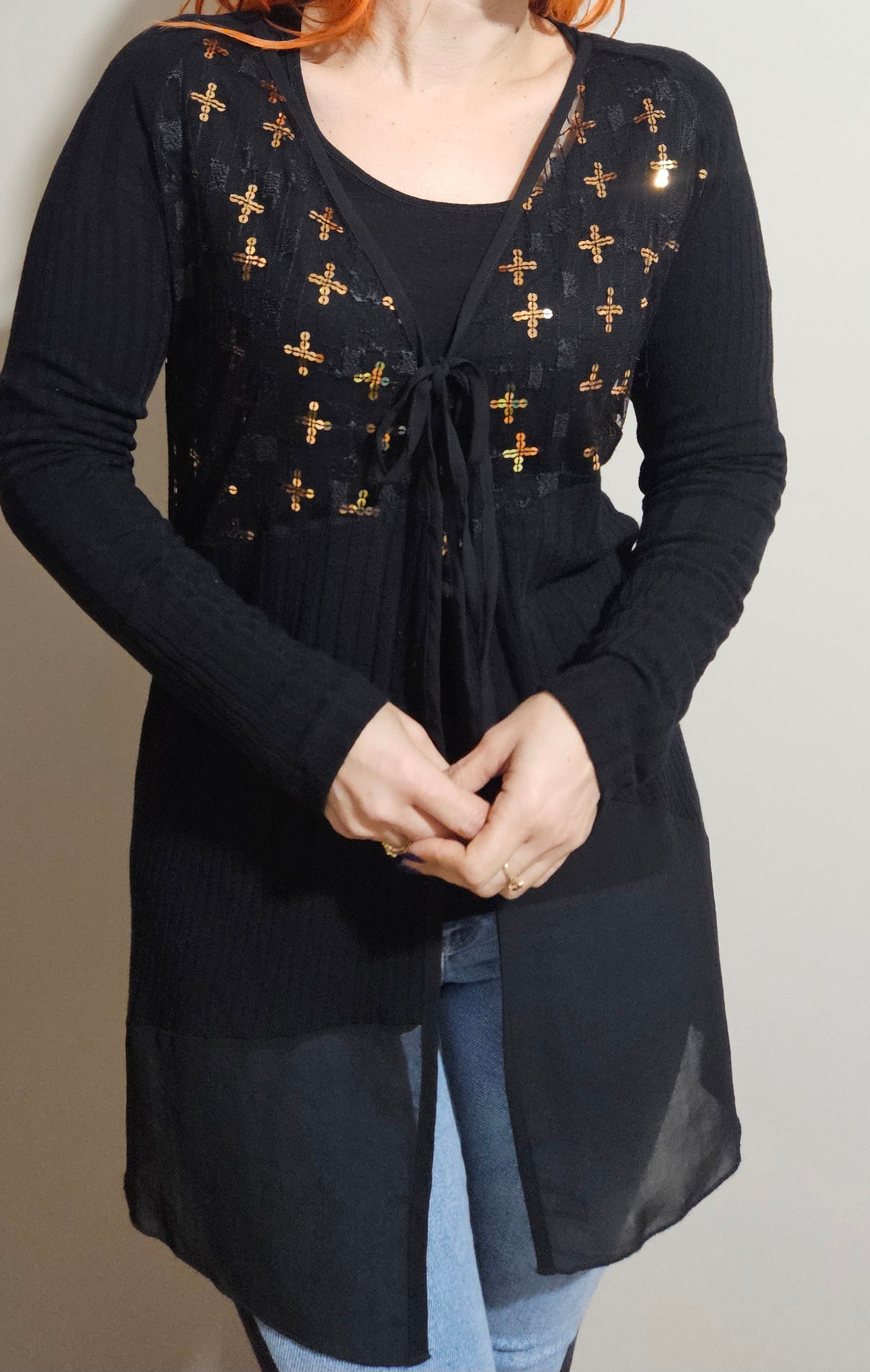 Black cardigan with gold patterns in second hand condition by David Ponds