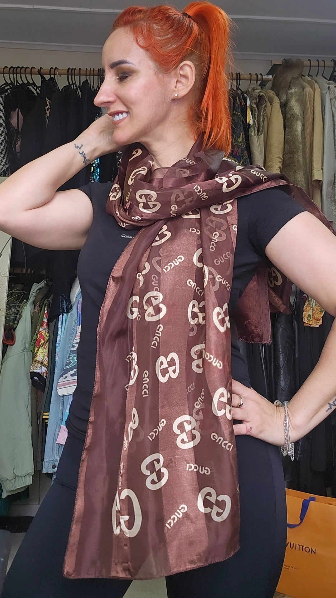 Gucci patterned scarf in a clothing store in second hand condition. In auckland for sale