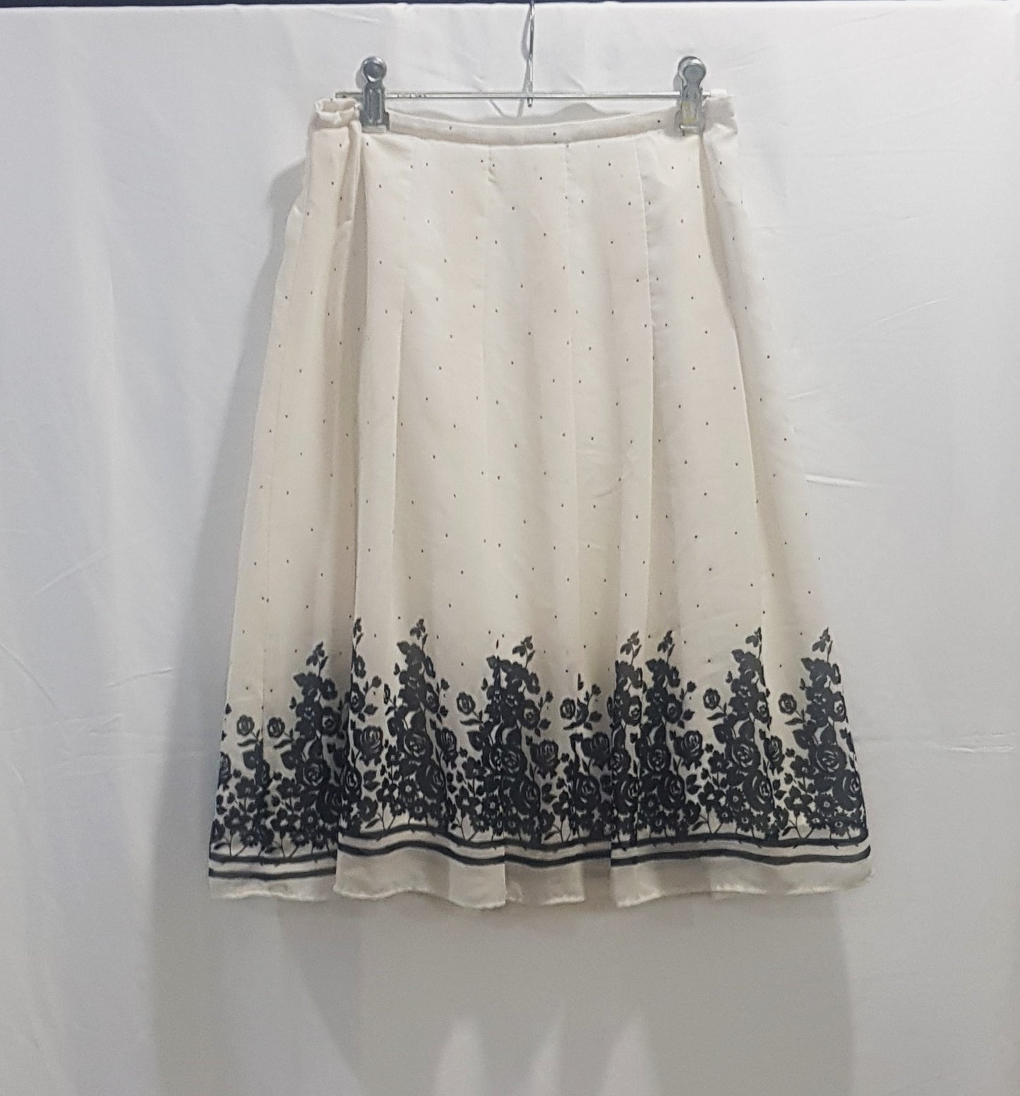Lovely polka Skirt with beautiful floral designs on the hem