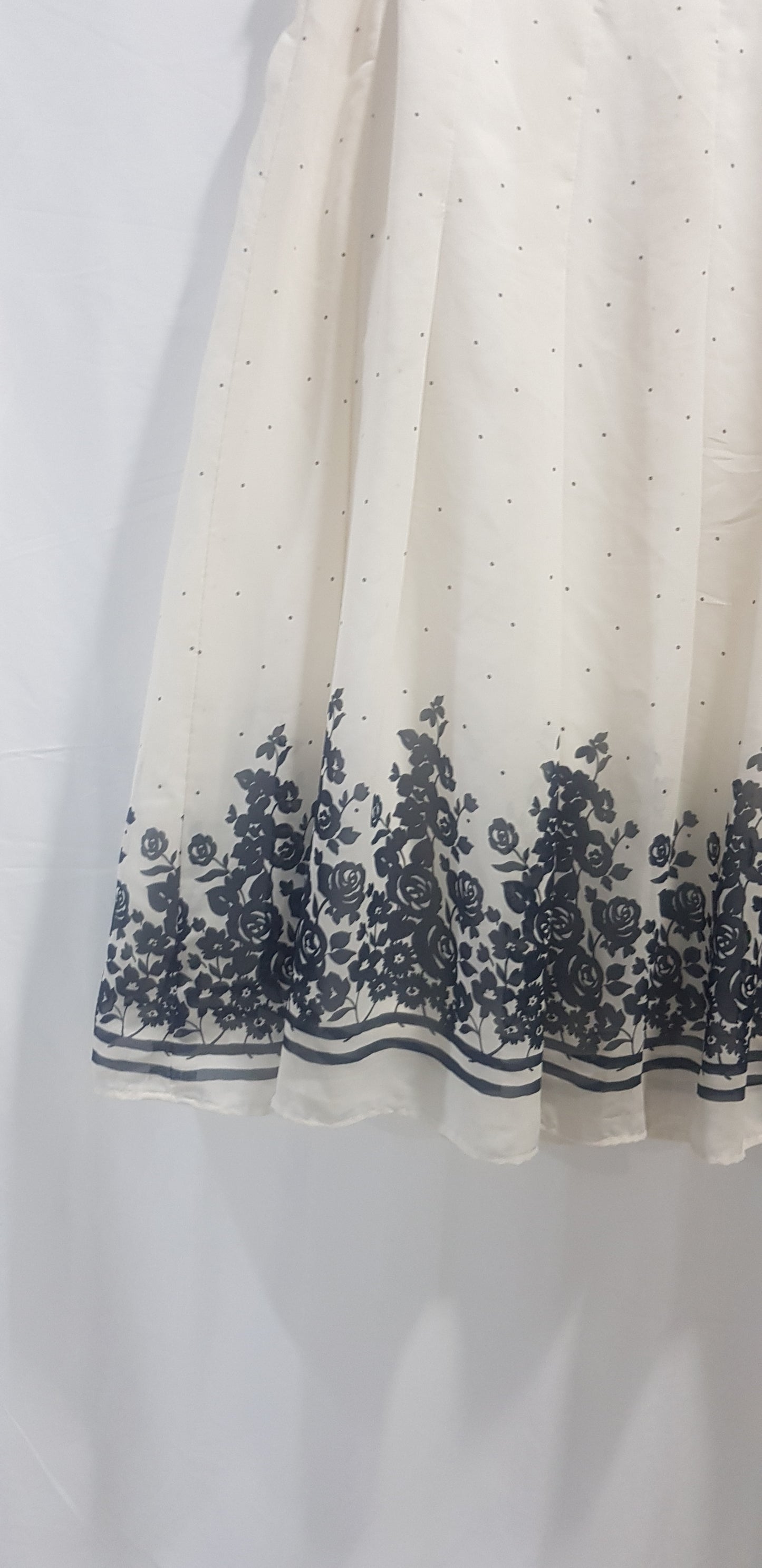 Lovely polka Skirt with beautiful floral designs on the hem