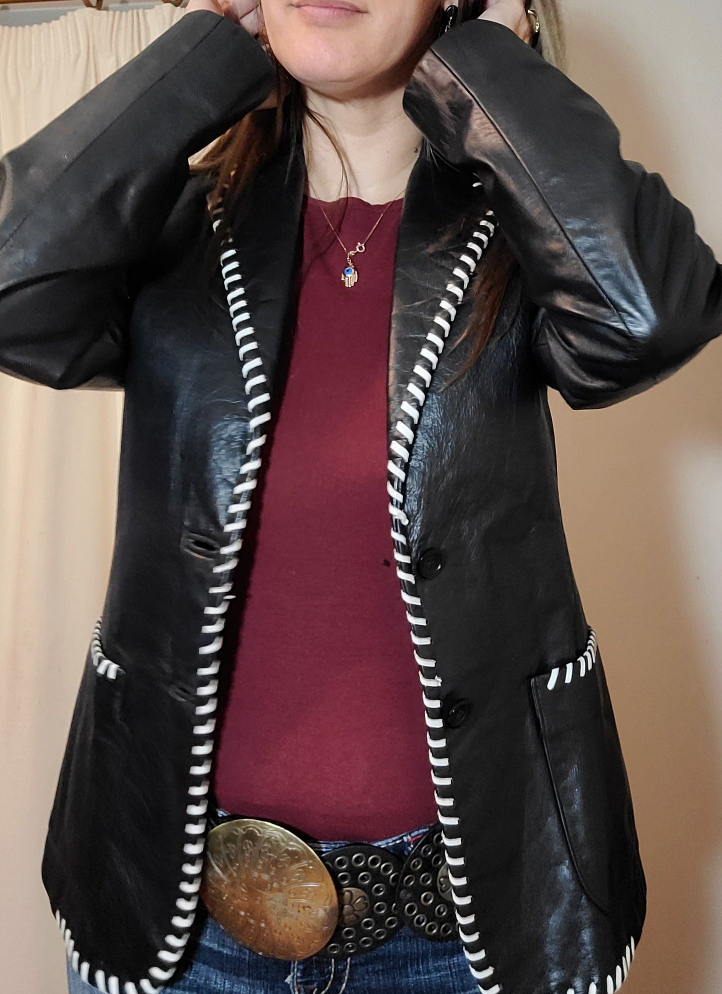 black leather jacket for sale in preloved condition with a white trim