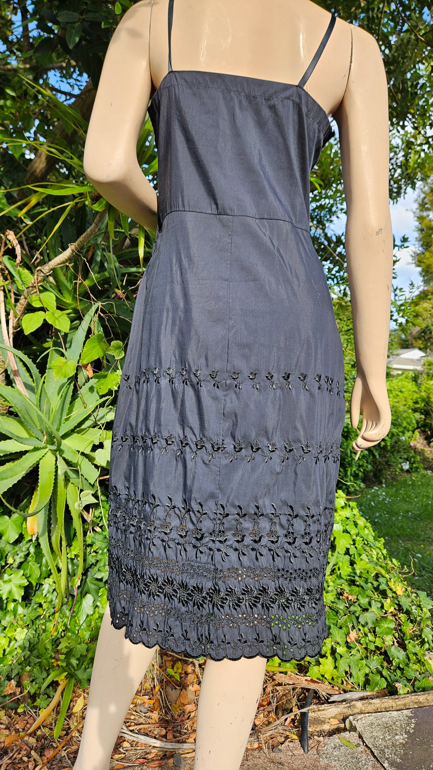 Adorable Black Midi Dress with embroidery details.