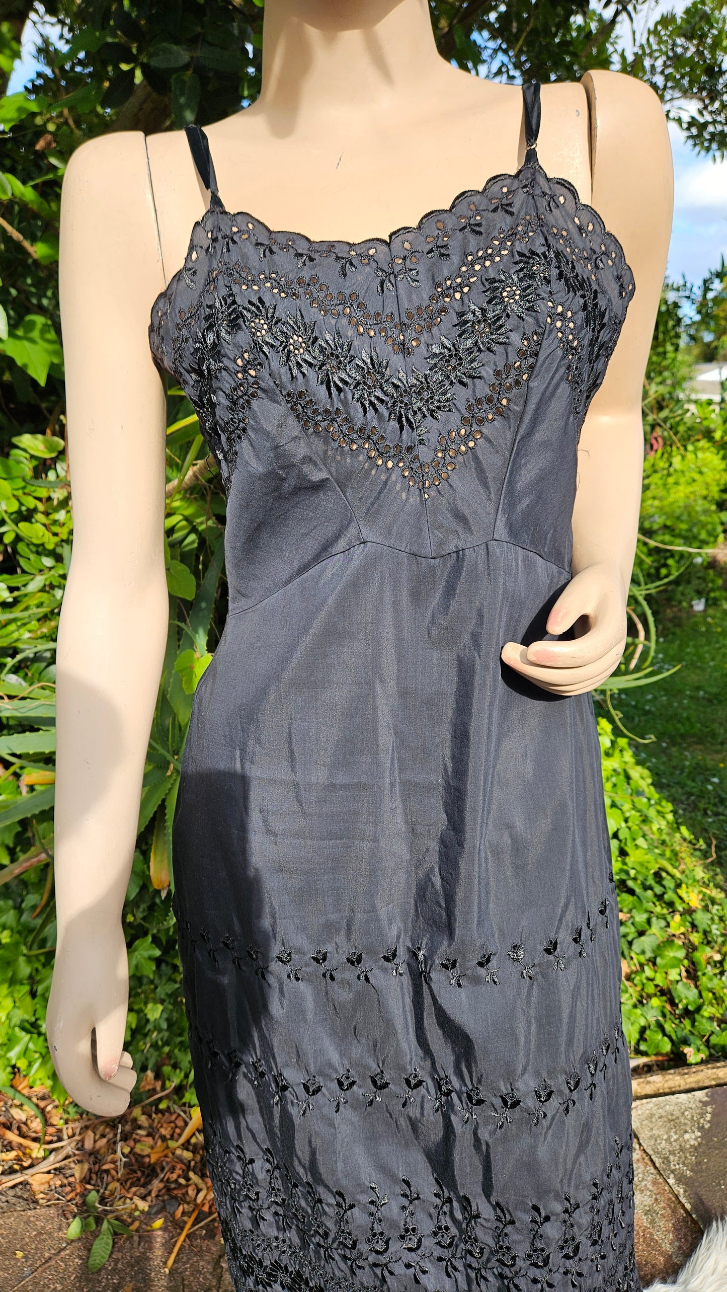 Adorable Black Midi Dress with embroidery details.