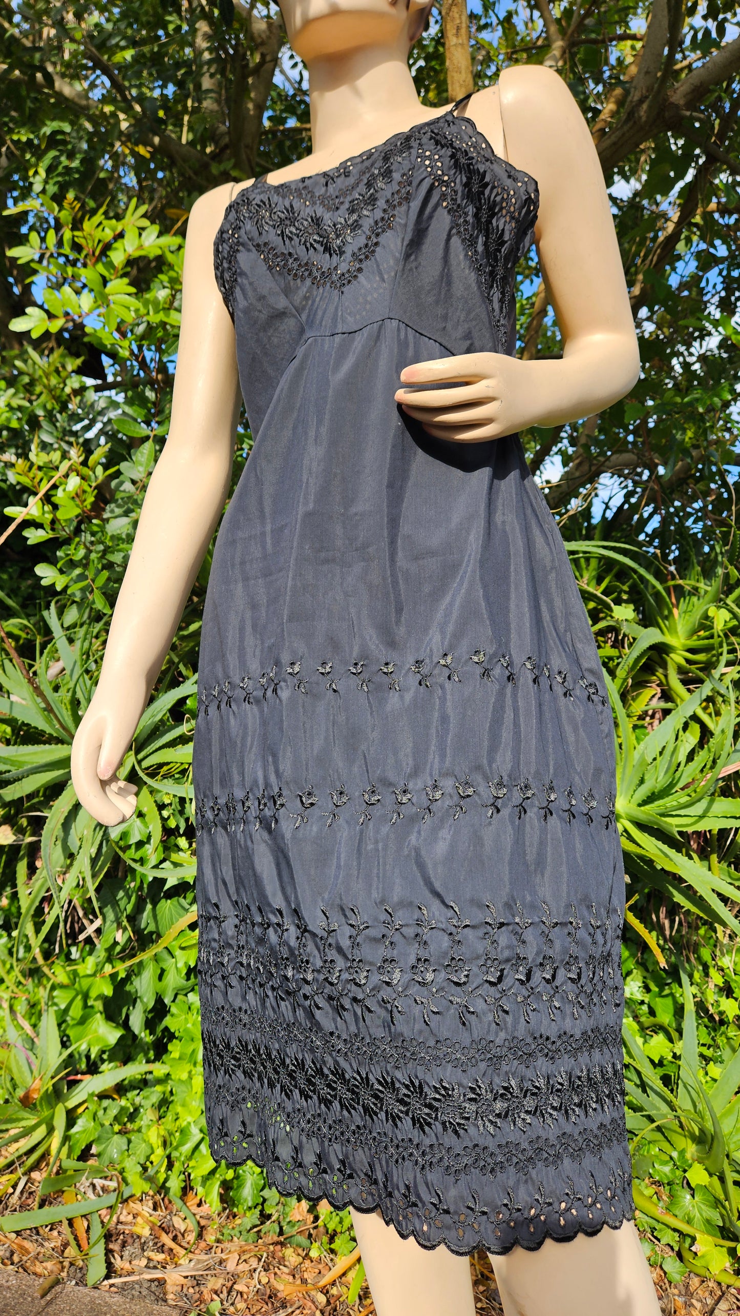 Adorable Black Midi Dress with embroidery details.