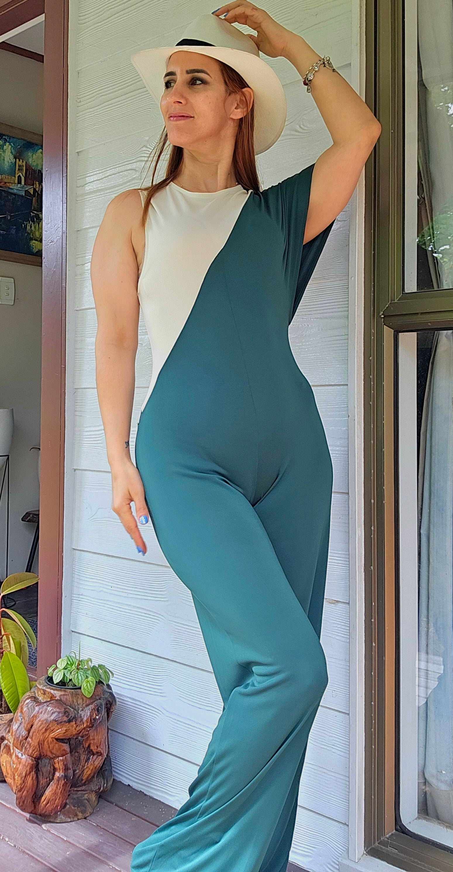 Zara color block hunter green and cream wide-leg jumpsuit with a cap sleeve and keyhole back closure. ZARA Jumpsuit Color Block Hunter Green Wide Leg- Preloved Jumpsuit - NWT jumpsuit in Auckland