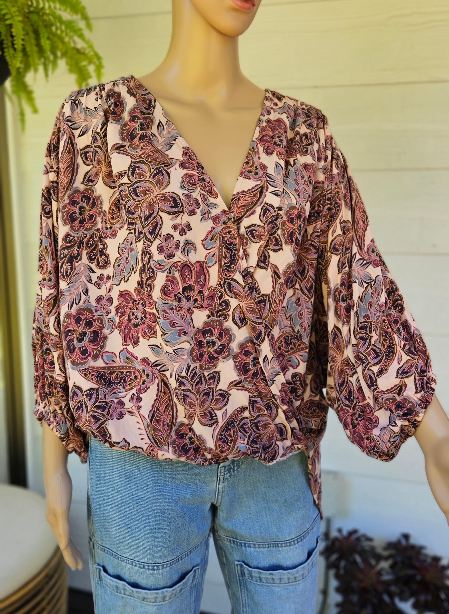 Floral blouse in a wrap style size Medium-large in good preloved condition