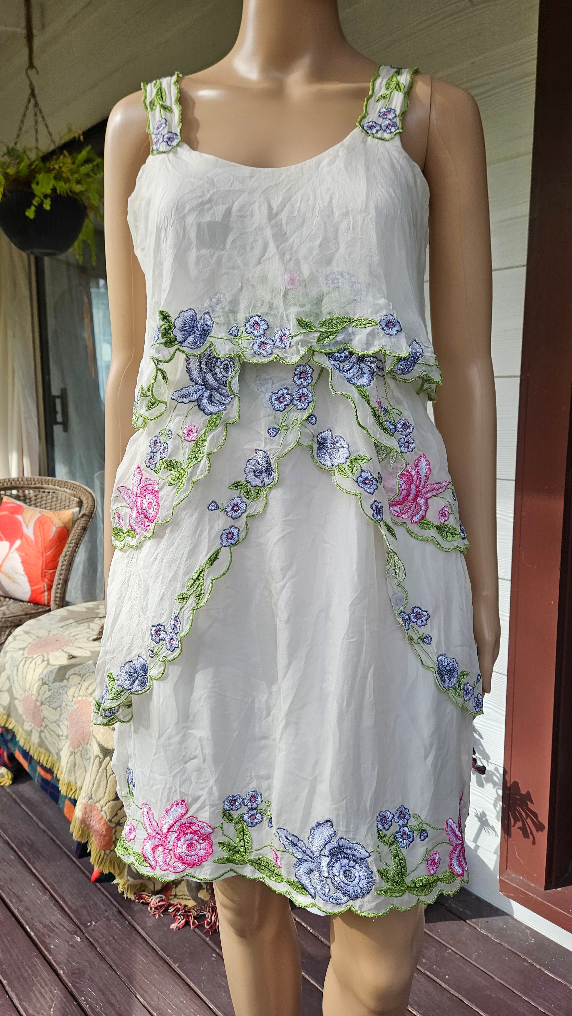 a white dress with floral embroidery on in good preloved condition available online at paothrift.co.nz or available in person in Auckland New Zealand