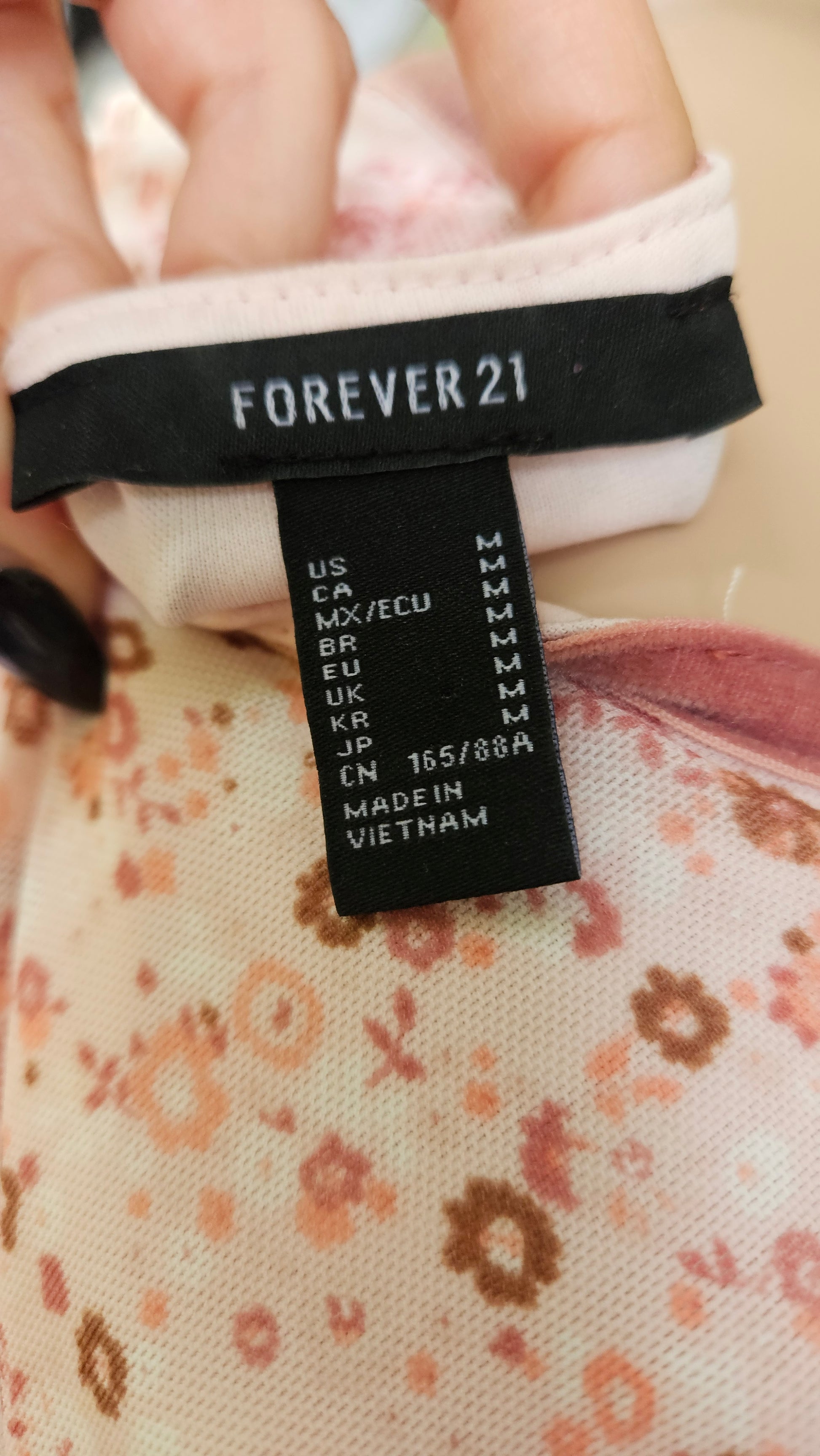 Forever 21 label on a floral fabric dress