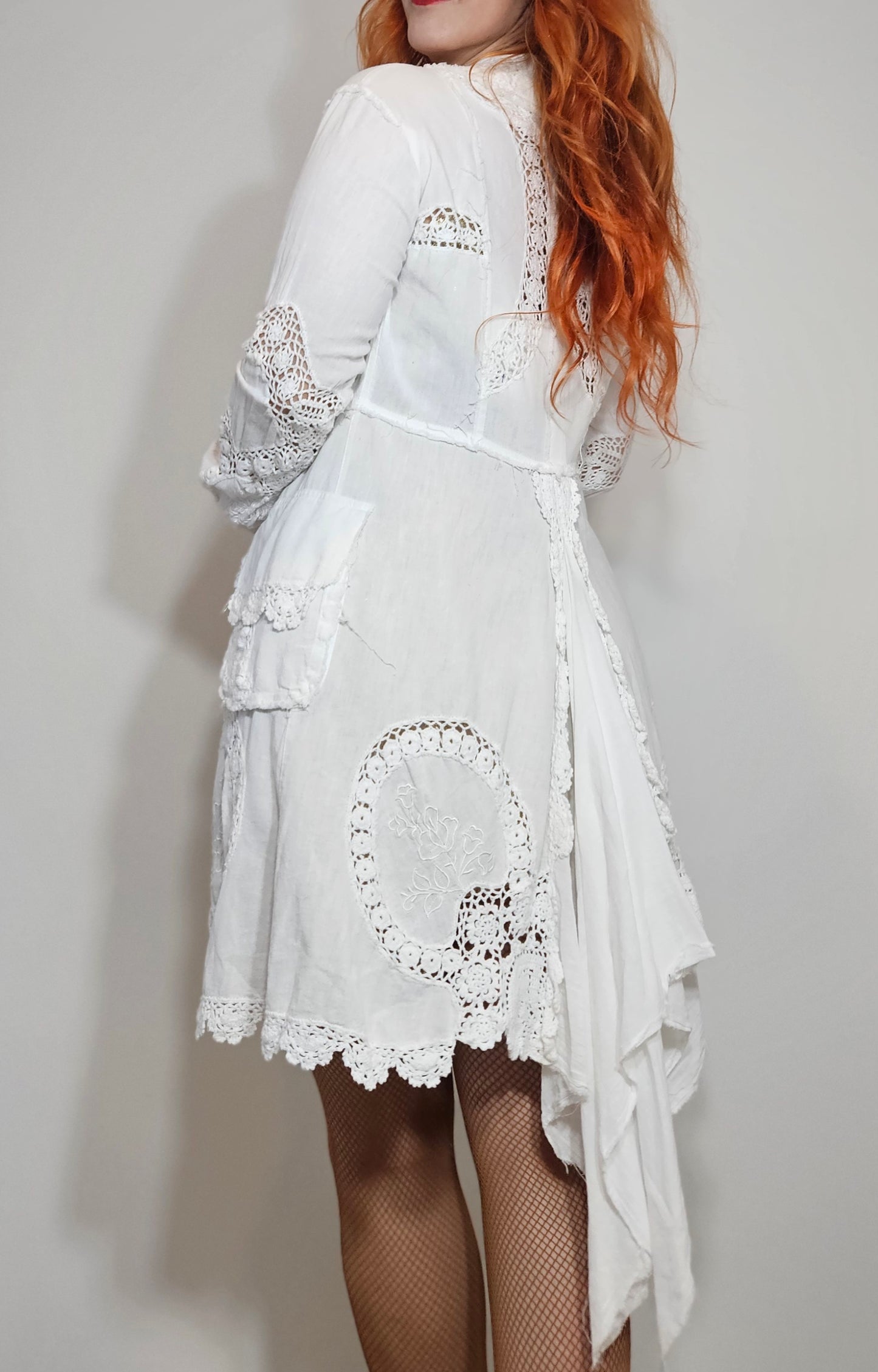 White Victorian-inspired preloved jacket with crochet lace detailing and romantic bohemian design, generous size Small, available at Pao Thrift NZ.
