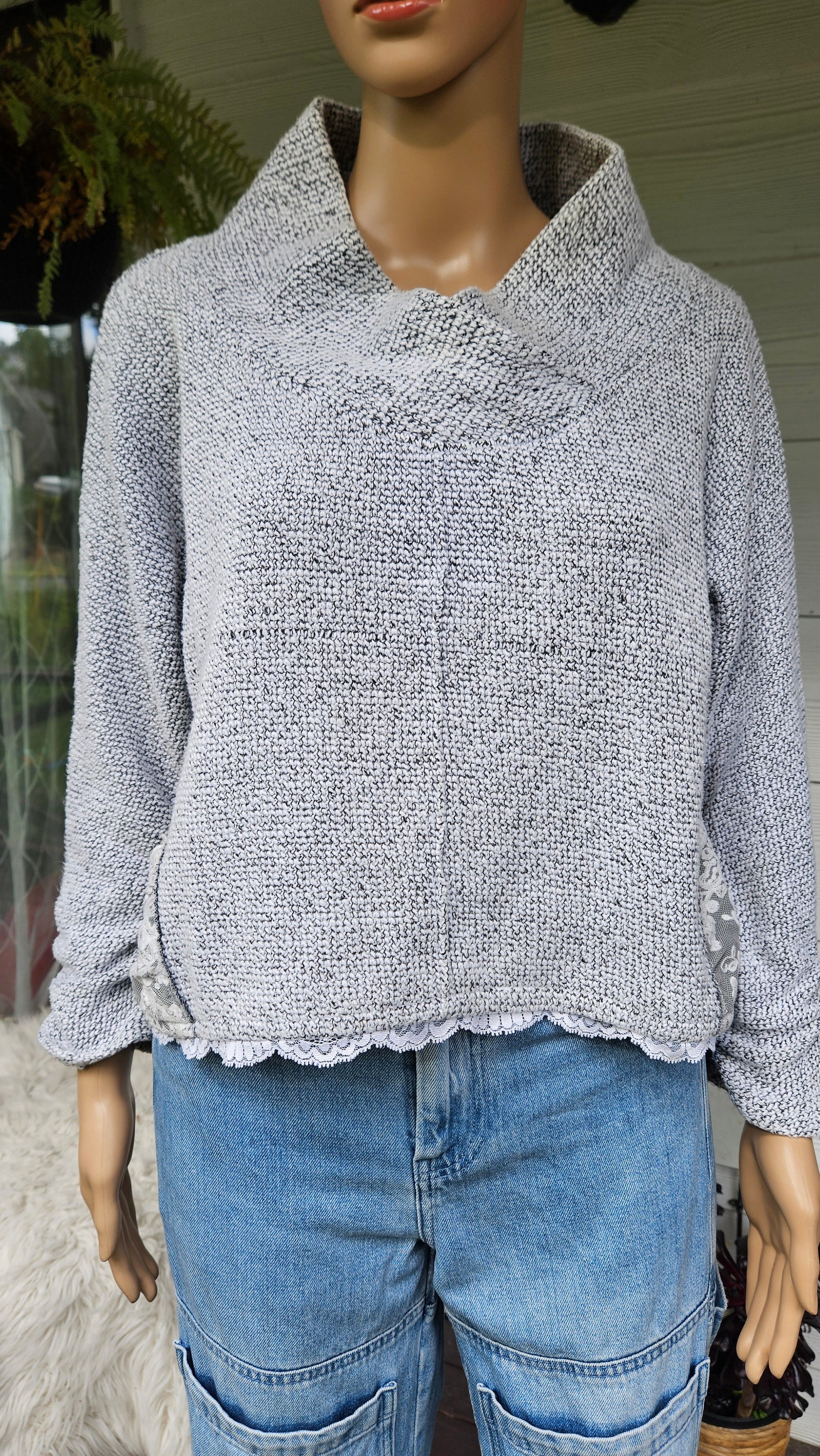 a gray textured sweater by lace made in new zealand