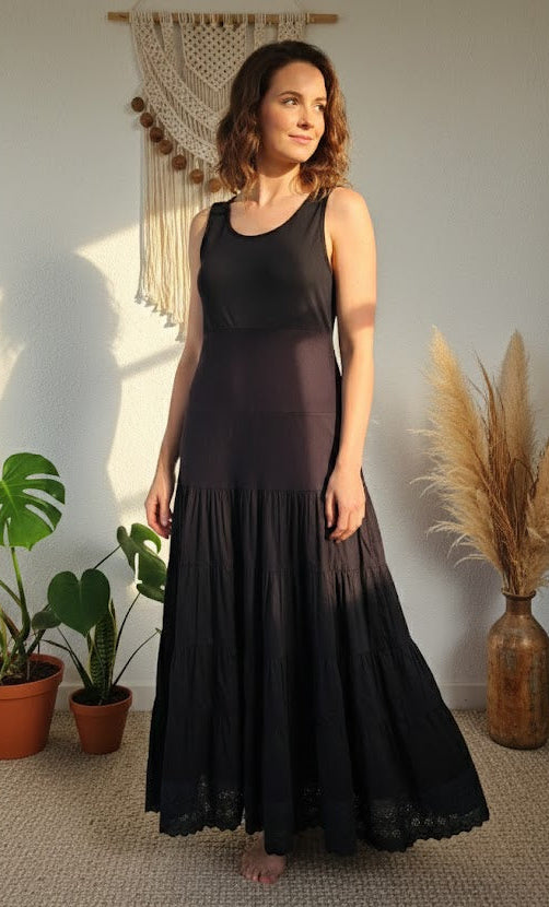 black sleeveless dress maxi dress in a bohemian style.