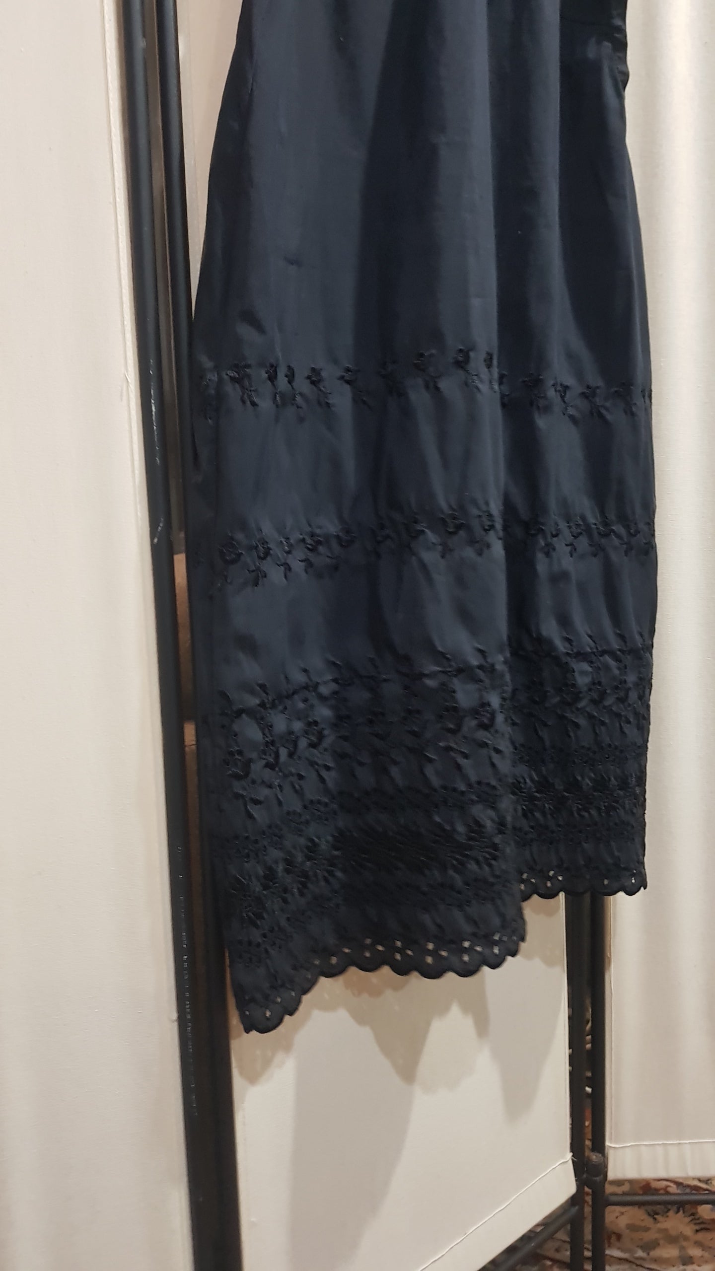 Adorable Black Midi Dress with embroidery details.